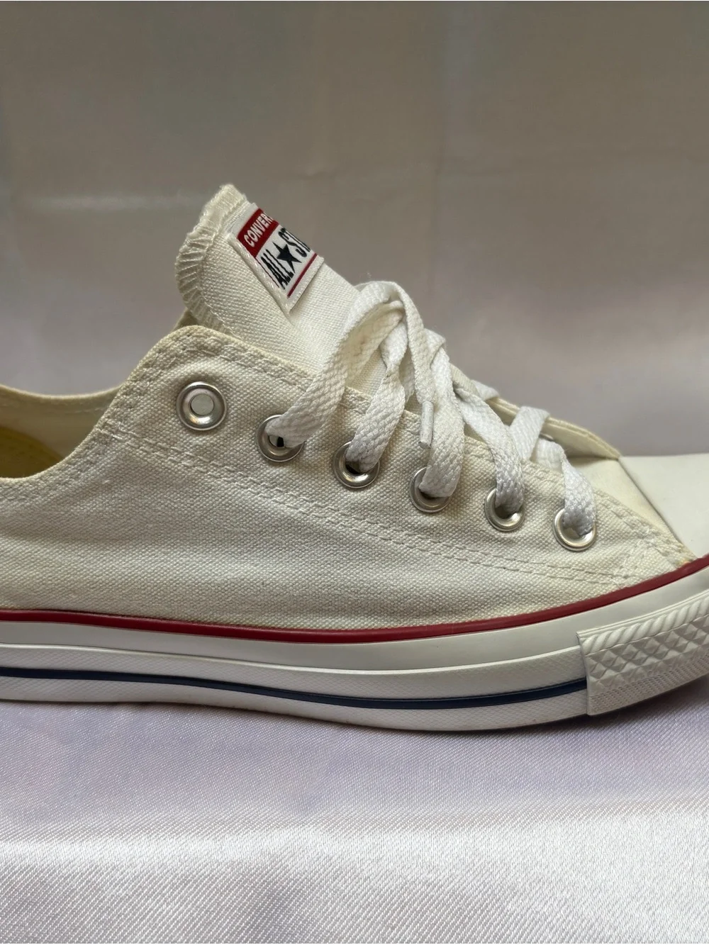 Converse Kids Low Top Sneakers in White with Red Trim